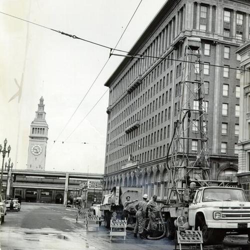 [Work crew drilling at Market and California streets]