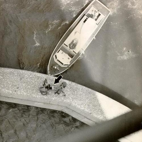[Coast Guard crew retrieving the body of a woman who committed suicide from the Golden Gate Bridge]