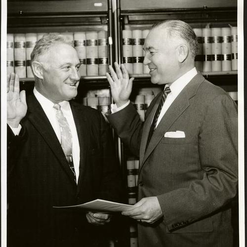 [Edward T. Mancuso being sworn into office as Public Defender by Gerald S. Levin]