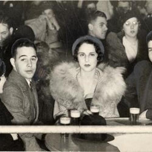 [Crowd in a bar in the Barbary Coast district]