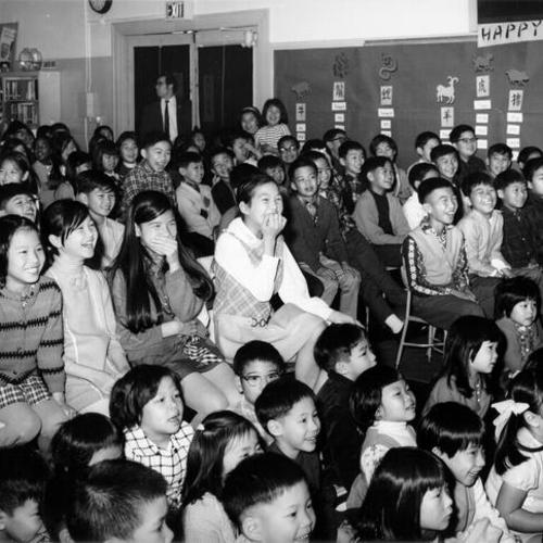 [Students watching a Chinese New Year program at Jean Parker School]