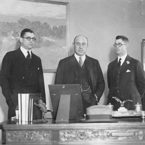 [Charles Blyth with Benjamin H. Dibblee and G.E. Stephens, Bankers Association]