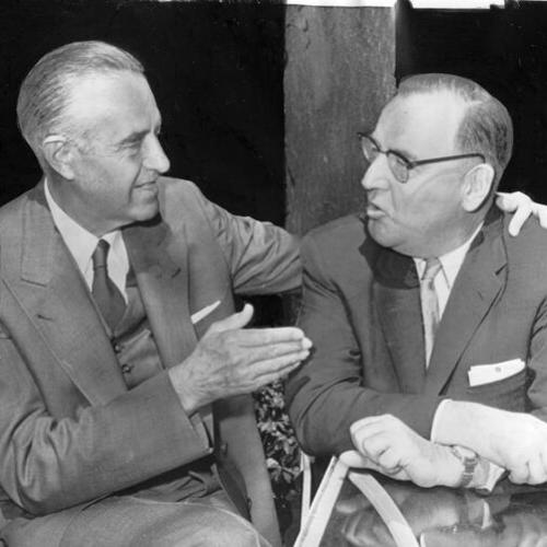 [Governor Averell Harriman (left) gestures as he talks with Edmund G. Brown]