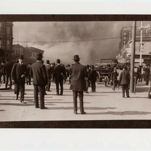 People on street watching fire burn after the 1906 earthquake