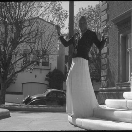 Sylvester standing at entrance steps to 2698 Pacific Avenue