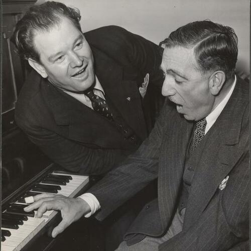 George Stinson (left) with Gaetano Merola singing at piano