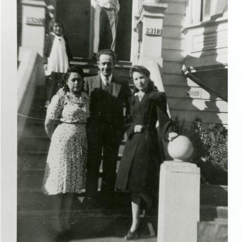 [Maria on the left, Apolinar and Sofia on stairs of Margarita's home on Sutter Street]