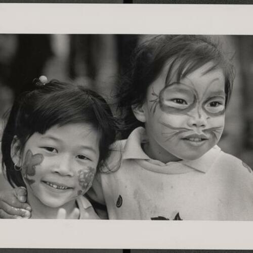 Children with face painting at Tenderloin Arts Festival on Leavenworth Street