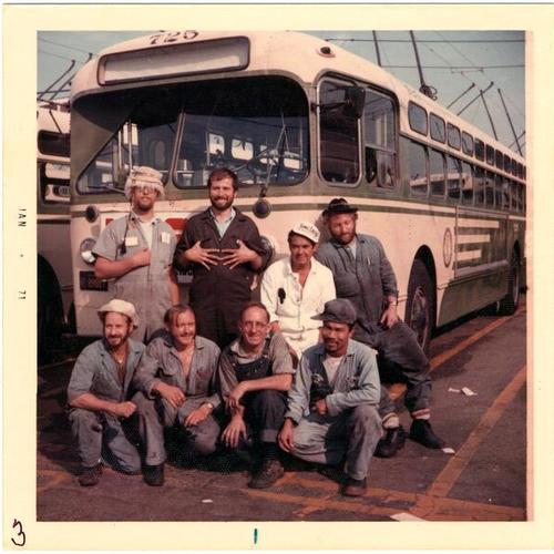 [John Gerrard Graham with Potrero Shop colleagues posed in front of Coach 725]