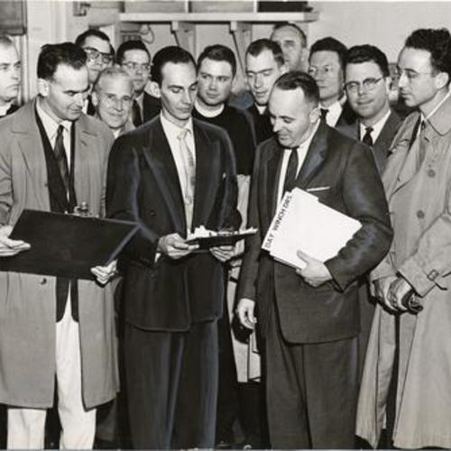 [Group of Bay Area ministers inspecting a longshoremen's hiring hall]