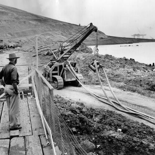 [William Manuel watching the construction of Candlestick Park near his home]