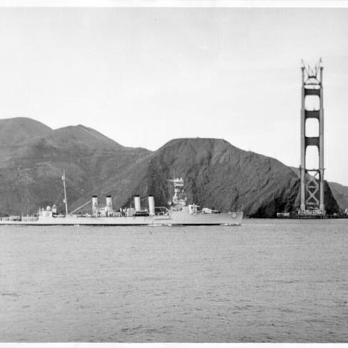 [Navy ship sails past Golden Gate bridge Marin tower]