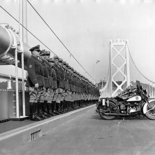 [Highway patrol officers stand in ranks on Bay Bridge]