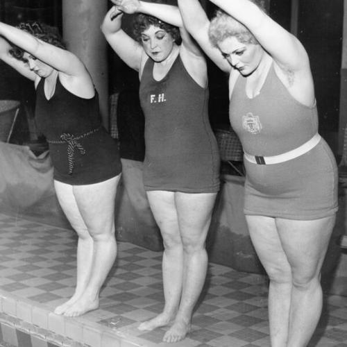 [Amazon Girls of the Odeon Music Hall posing by the swimming pool at the Fairmont Hotel]