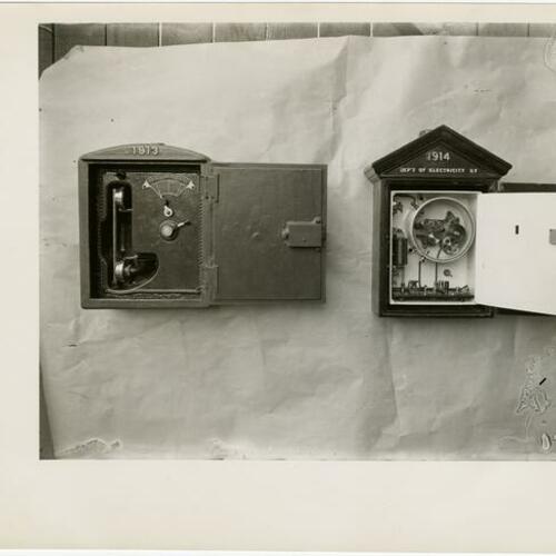 [Two SF Police call boxes. Box 1913 engraved with "phone, wagon, urgent." Box 1914 Dep't of electricity SF.]