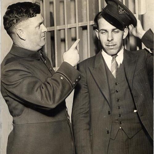 [William Carl and Police officer A.P. Kerwias]