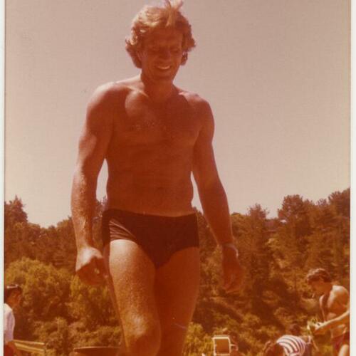David Kopay in swimwear standing near the water at Lake Tahoe