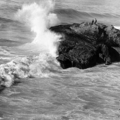 [Waves breaking on a large rock at Ocean Beach]