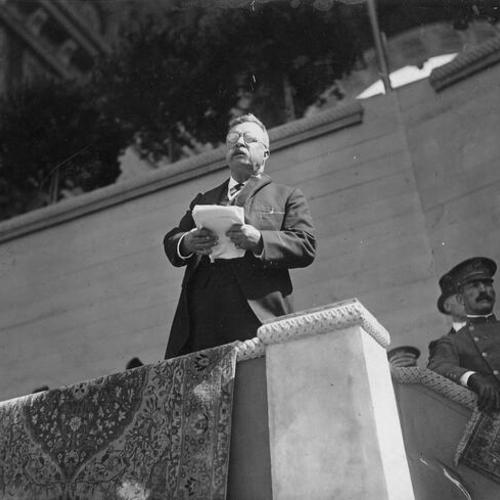 [President Roosevelt giving a speech on Roosevelt Day]