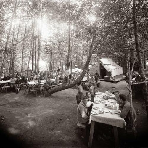 People gather for meal at Camp McCoy