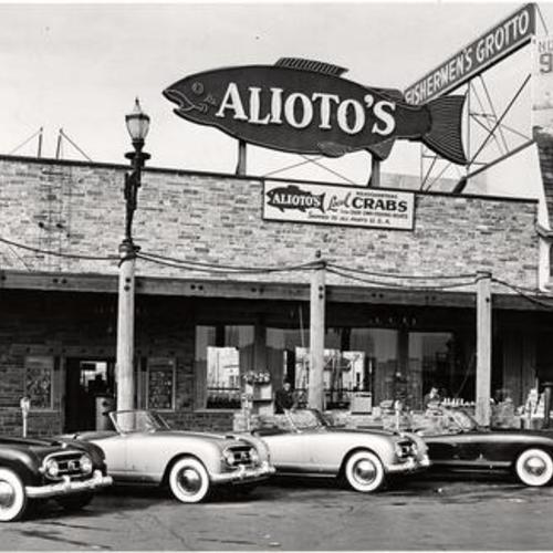 [Several Nash-Healeys parked outside of Alioto's restaurant located in the Fisherman's Wharf]