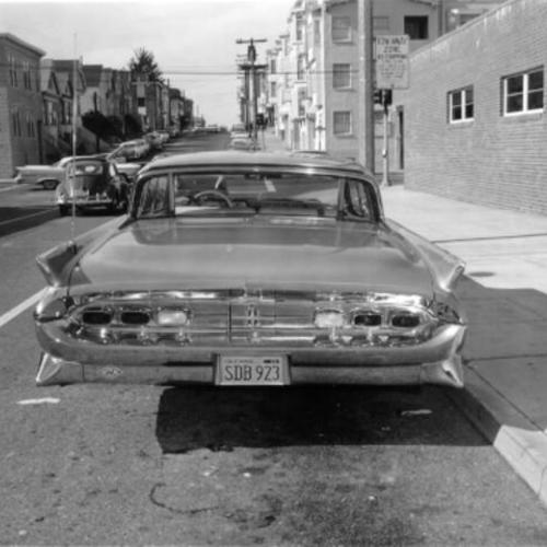[Tail end view of a parked car on 448 - Laurel street]