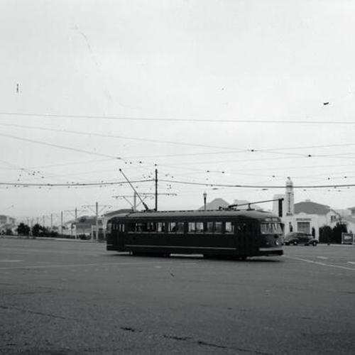 [St. Francis Circle looking northeast at new Muni "Magic Carpet" car on first day of service on "K" line]