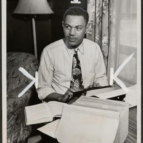 William Lenox Cobb at typewriter