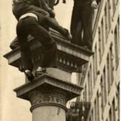 [Soldiers climbing the Native Sons Statue]