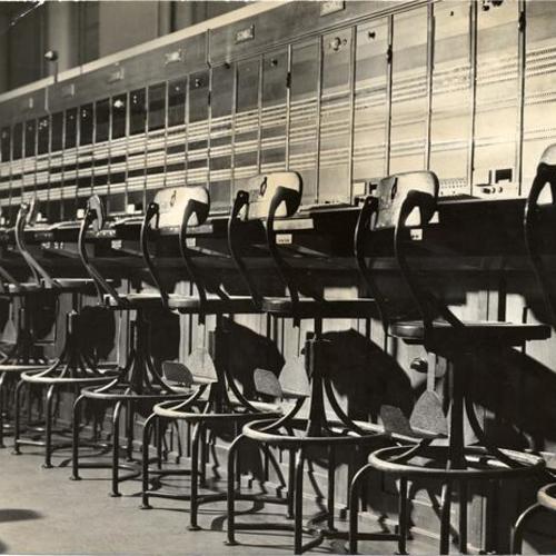 [Vacant seats at a switchboard of the Pacific Telephone & Telegraph Company during strike]