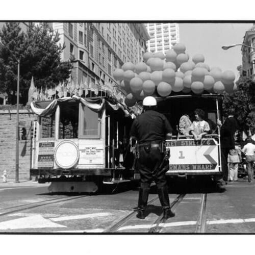 [Two cable cars on Powell Street on the day the cable car system was shut down for renovation]