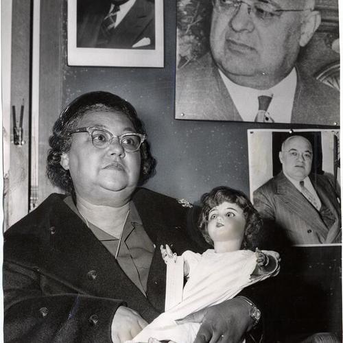 [Mrs. Gladys Stevens and doll given her by her father, Ernest Torregano]