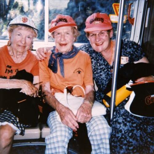 [Giants fans Elinor, Marian and Claire on the way home after the game in 1992]