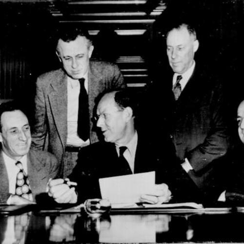 [Harry Bridges and a panel appointed by the Secretary of Labor discuss the West Coast Longshoremen's strike]
