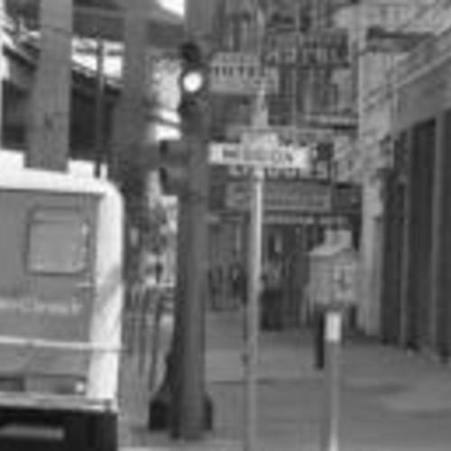 [Hotels and businesses on the 100 block of Embarcadero as seen from the corner of Mission]