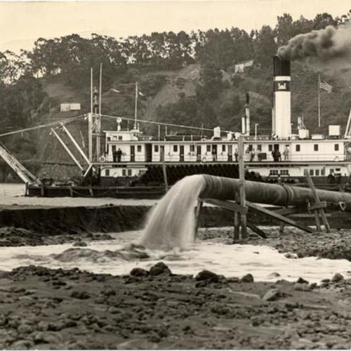 [Pumping of Yerba Buena shoals during creation of Treasure Island for site of the Golden Gate International Exposition]