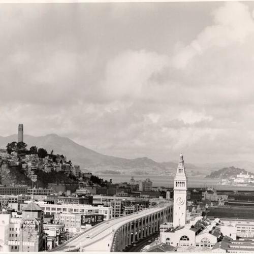 [View of Ferry Terminal and Embarcadero Freeway, with Telegraph Hill in background]