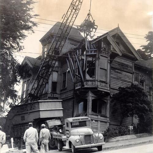 [Wrecking crew tearing down house at 3100 Pacific Avenue]