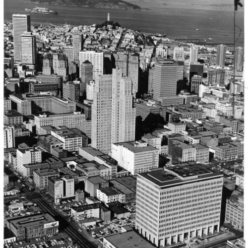 [Aerial view of San Francisco from near Folsom Street, looking north, with Coit Tower and Alcatraz Island visible in distance]