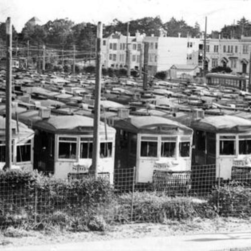 [Streetcars stored in lot at Lincoln Way and Funston Avenue]
