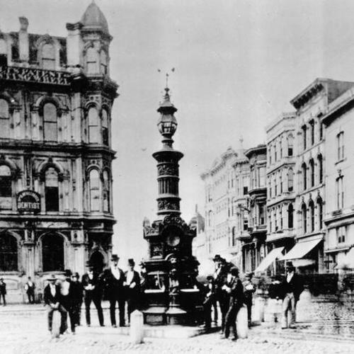[Unidentified group of people posing in front of Lotta's Fountain]