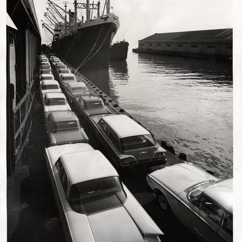 [Automobiles lined up in preparation for being loaded onto the SS Hawaiian Packer]