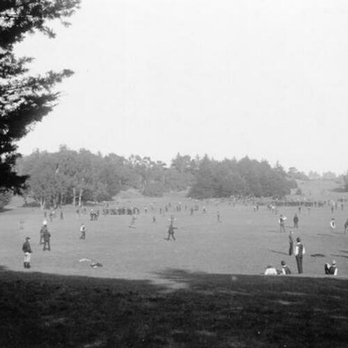 [People scattered across field during Big Rec Day in Golden Gate Park]