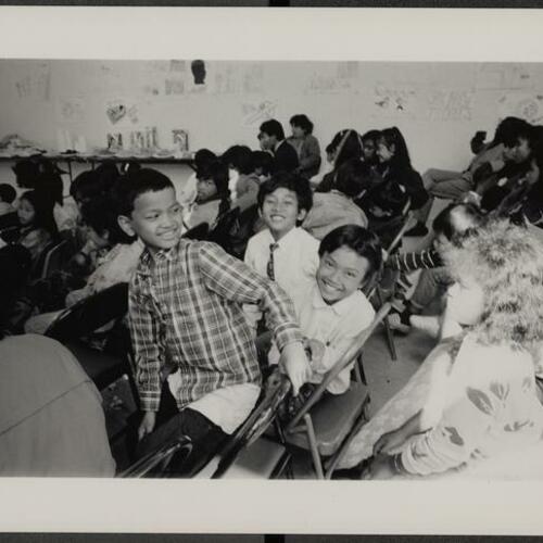 Children seated for Cambodian language school graduation ceremony at Boeddeker Recreation Center