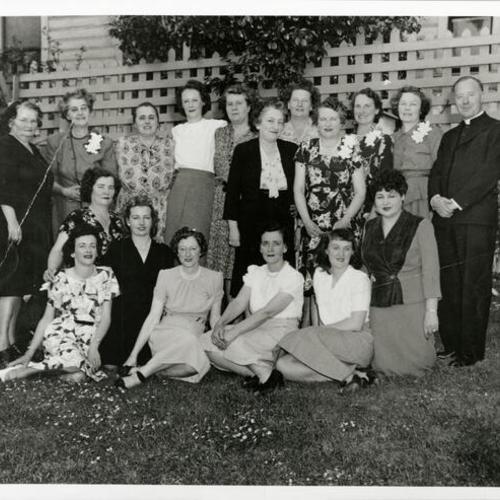 [Mission Dolores Mothers Guild posing in a garden]