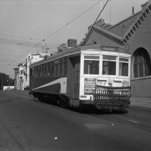 [Oak between Divisadero and Broderick street looking west at outbound #20 line car 294 passing Oak and Broderick car house]