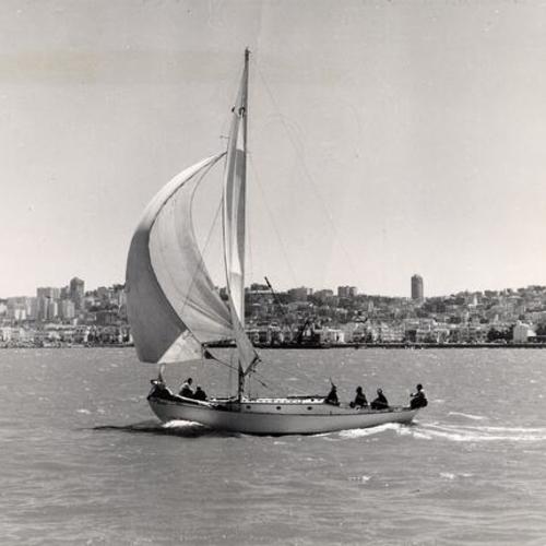 [Sailboat "Nautigal" gliding along the Marina shore]