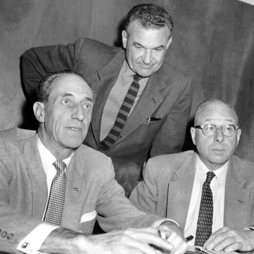 [Harry Bridges with J.R. Robertson and Henry Schmidt at press conference]