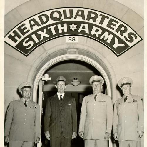 [Major General Milton B. Halsey and three other men at Sixth Army Headquarters, Presidio of San Francisco]