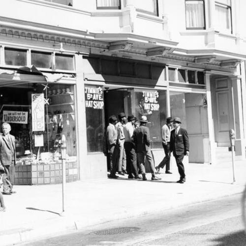 [Group of men standing outside Jimmie's 5th Ave. Hat Shop on Fillmore Street]